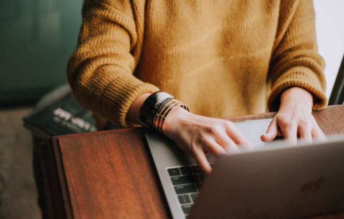 woman entrepreneur using laptop